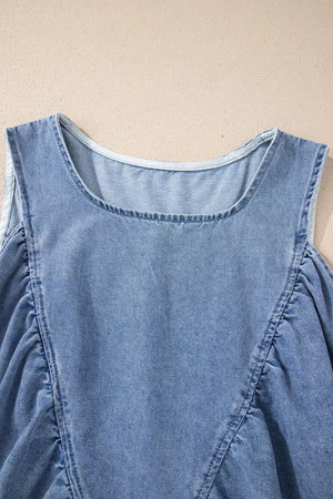 V-neck pleated denim sleeveless top with a casual cut.