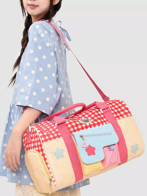 Charming red gingham duffel bag with colorful pockets and star details.
