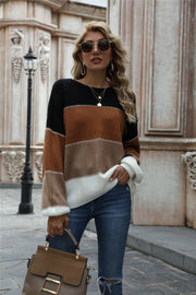 Crewneck knit sweater with horizontal color blocks in black, brown, beige, and white acrylic.