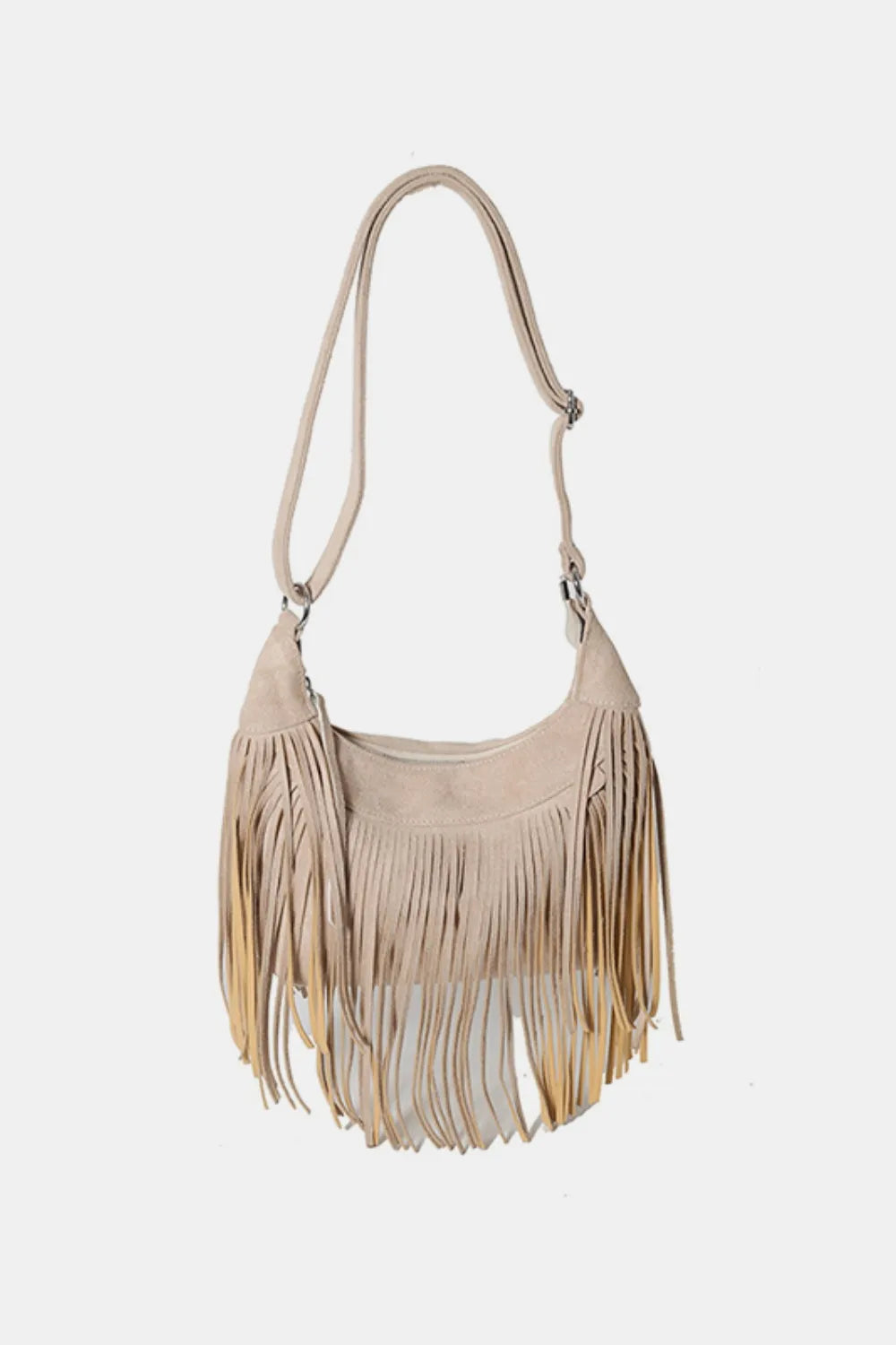 Bohemian suede crescent crossbody bag with fringe detail in caramel.