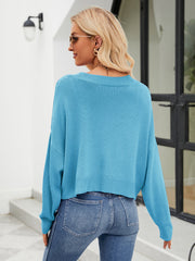 Sky blue cropped V-neck knit cardigan with button details and ribbed hem.