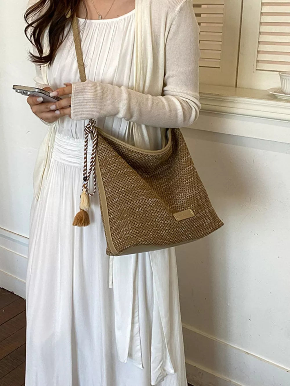 Tassel Woven Crossbody Bag in French Blue, back view
