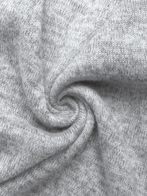 Light gray knit maxi dress fabric detail with a V-neckline and lace accents.