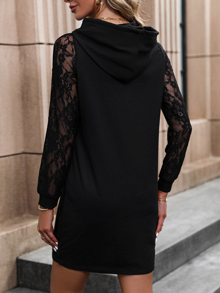 Black hooded mini dress with lace sleeves and a casual cut.