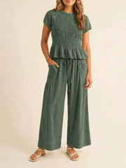Smocked Peplum Top And Wide-leg Pants Set in Terracotta, back view