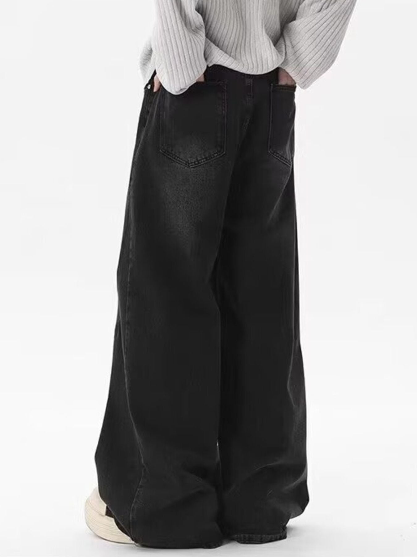 Men's black vintage wash wide-leg jeans, 100% cotton.