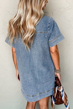 Light blue denim mini dress with short sleeves and a casual fit.