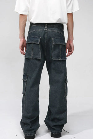 Dark denim cargo pants with multiple pockets and contrast stitching.