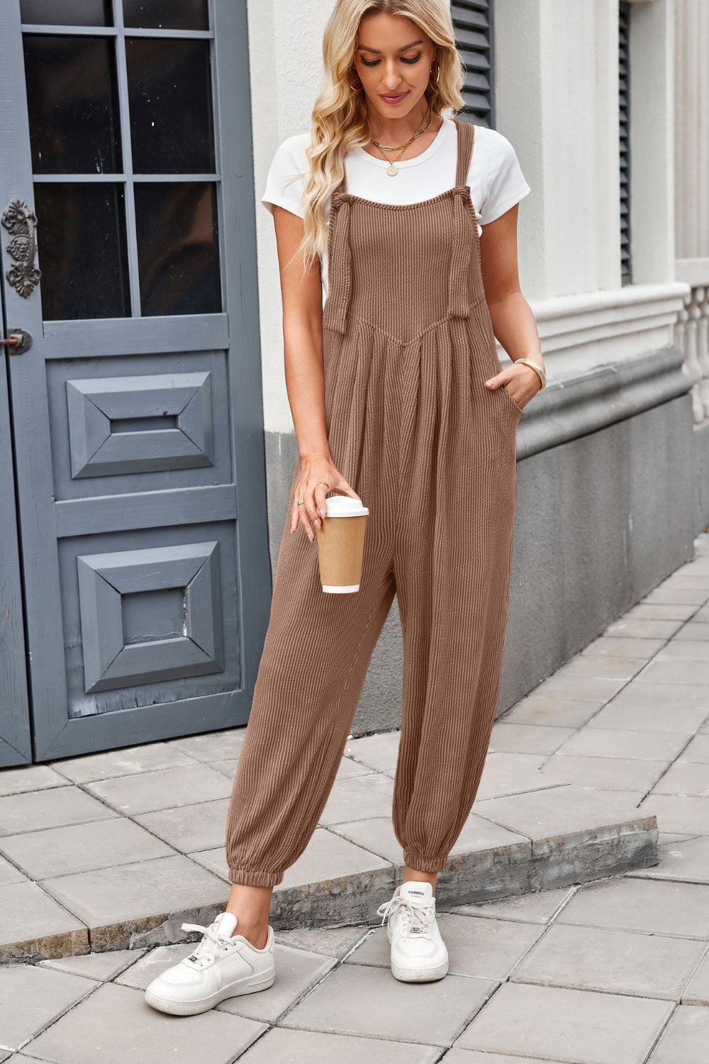 Brown corduroy overalls with barrel leg and pleated front detail