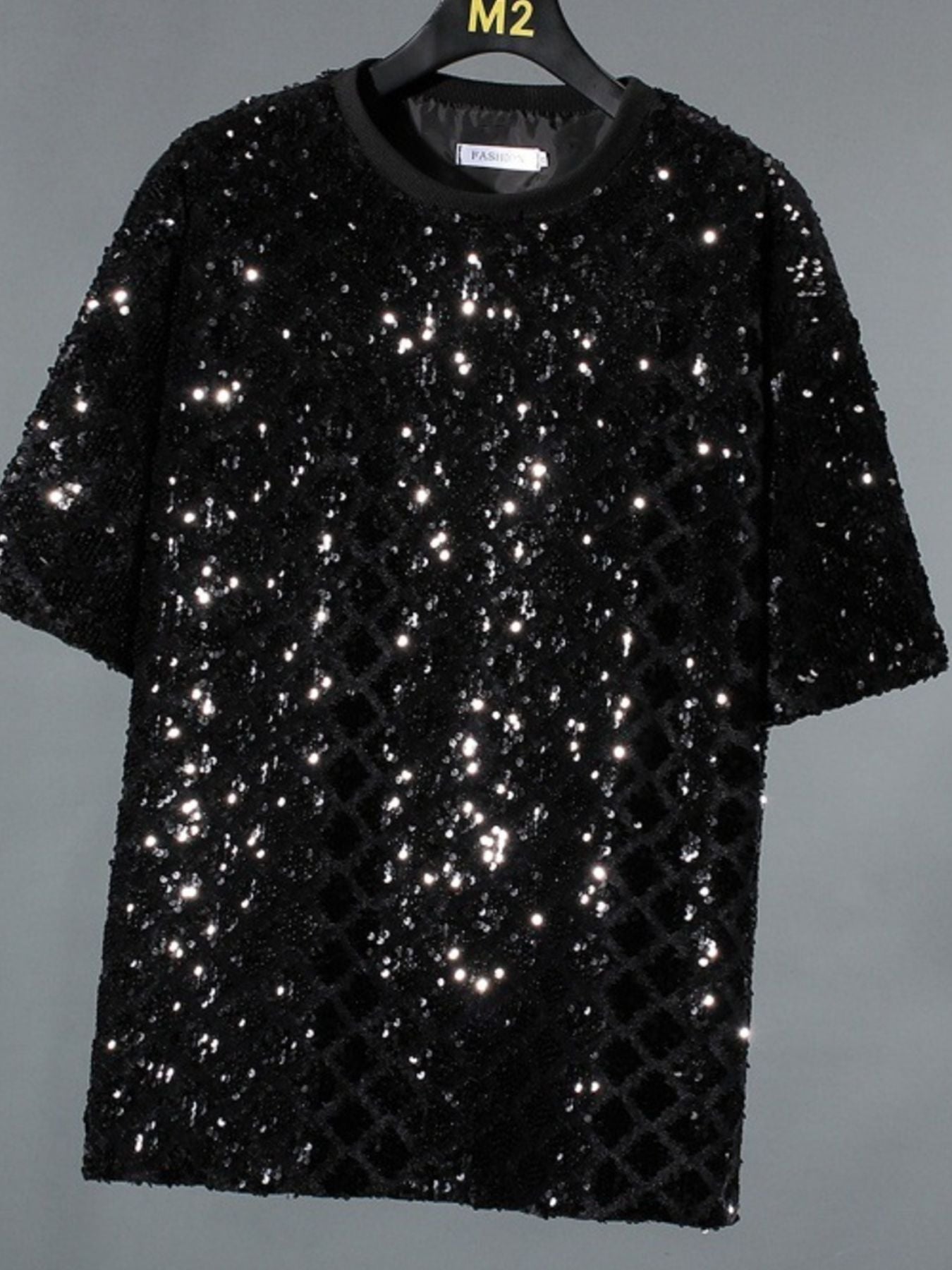 Men's black sequin round neck t-shirt with all-over sparkle and diamond pattern detail.