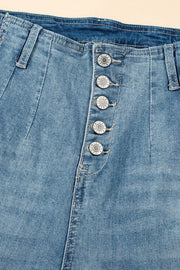 Button-fly wide-leg denim trousers in medium wash, featuring five silver button closures.