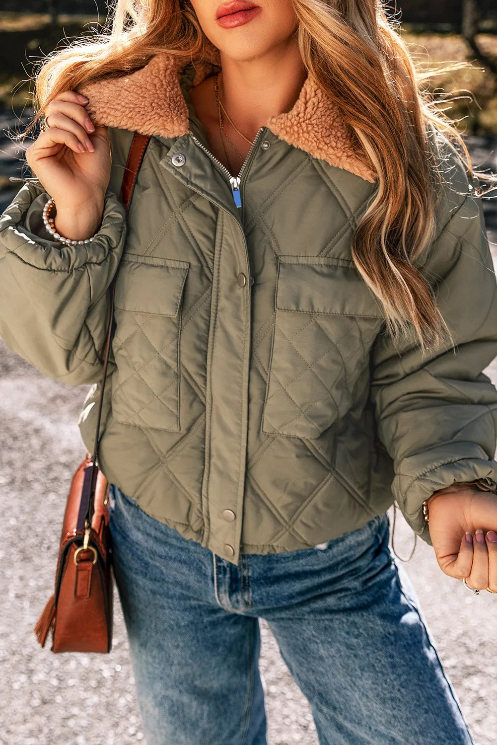 Quilted utility jacket in sage with a cozy shearling collar and chest pockets.