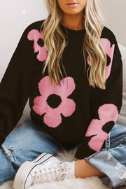 Black acrylic crewneck sweater with pink floral intarsia pattern