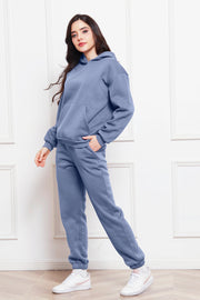 Light blue relaxed fit hoodie and joggers set with a front pocket.