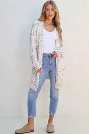 Confetti knit open-front cardigan in ivory with colorful speckles, long sleeves, and a relaxed fit.