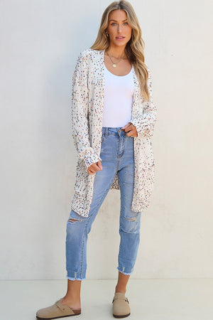 Confetti knit open-front cardigan in ivory with colorful speckles, long sleeves, and a relaxed fit.