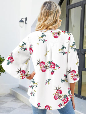 White floral print blouse with flutter sleeves and V-neck
