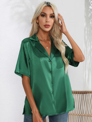 Dark green satin tie-front collared shirt with short sleeves and button front.