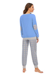 Pastel blue lounge set with grey polka dot pants and contrast trim.
