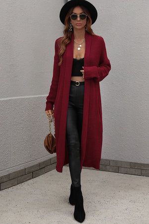Textured knit maxi cardigan in wine with open front and long sleeves.