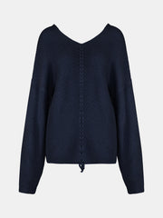 Dark Blue knit sweater with V-neck and lace-up detail on back.