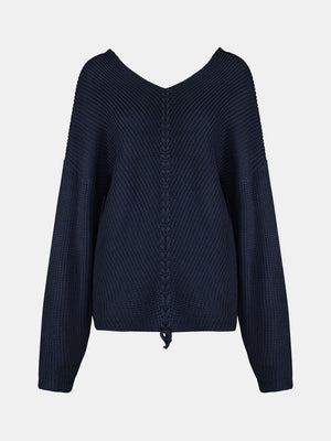Dark Blue knit sweater with V-neck and lace-up detail on back.