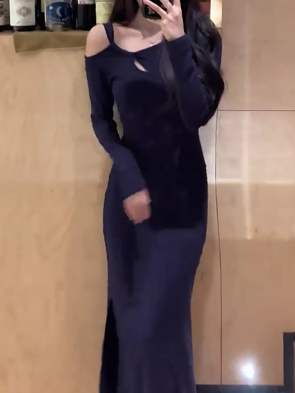 Navy cutout asymmetrical long sleeve maxi dress with a high slit