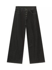 Relaxed fit dark wash denim jeans with button fly and white stitching.