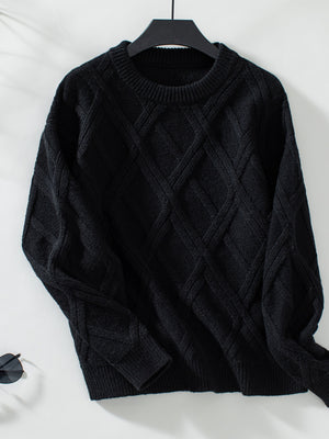Black diamond cable knit crewneck sweater with ribbed cuffs and hem.