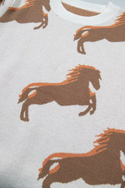 White knit sweater with allover brown and orange horse print and crew neck.