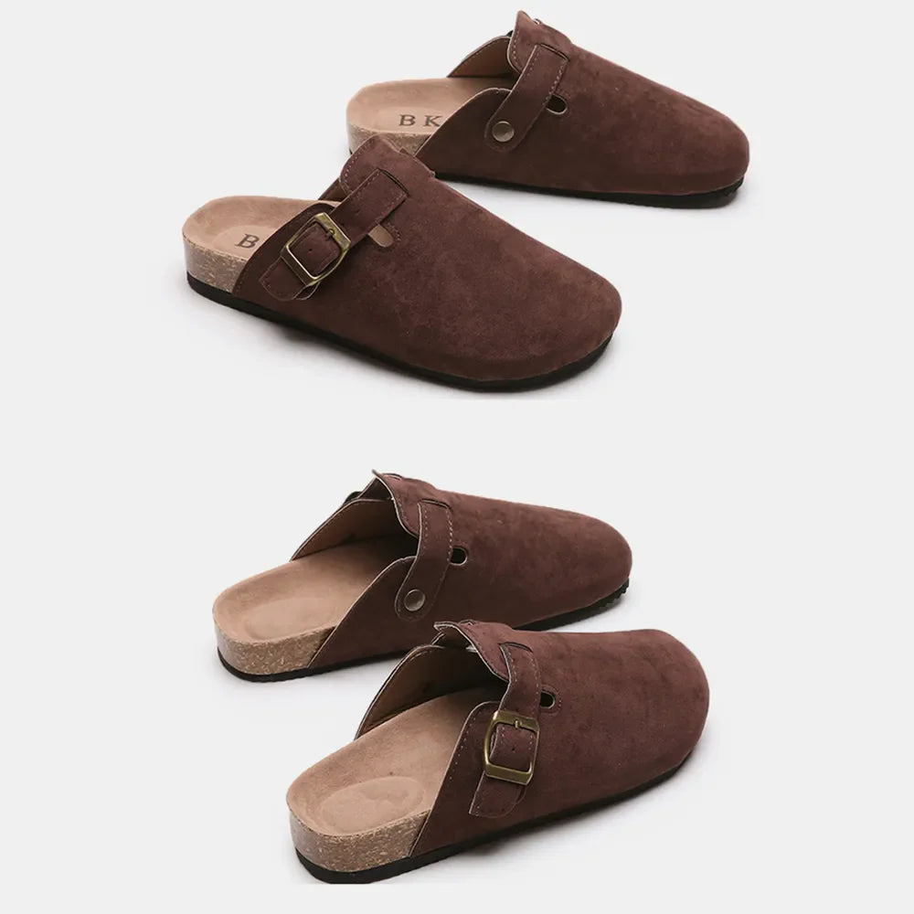 Chocolate suede clog slides with cork sole and adjustable buckle strap.