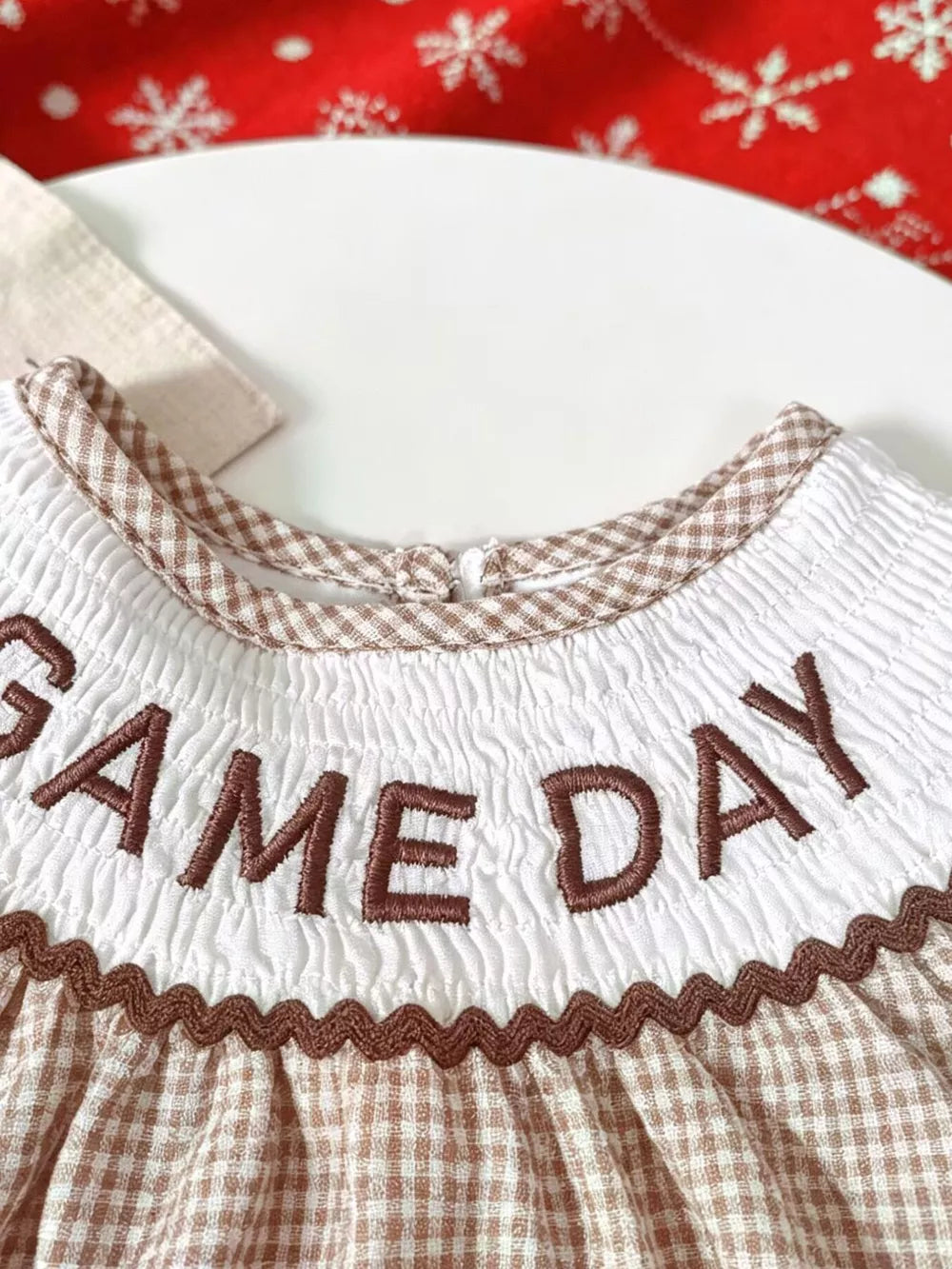 Children's Gingham Football Puff Sleeve Dress in Brown, side view