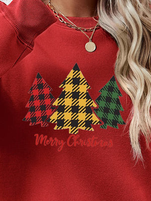 Red crewneck sweatshirt with plaid trees graphic and Merry Christmas text.