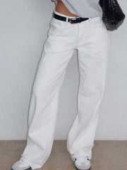 White wide-leg denim jeans with contrast stitching and a buttoned fly.