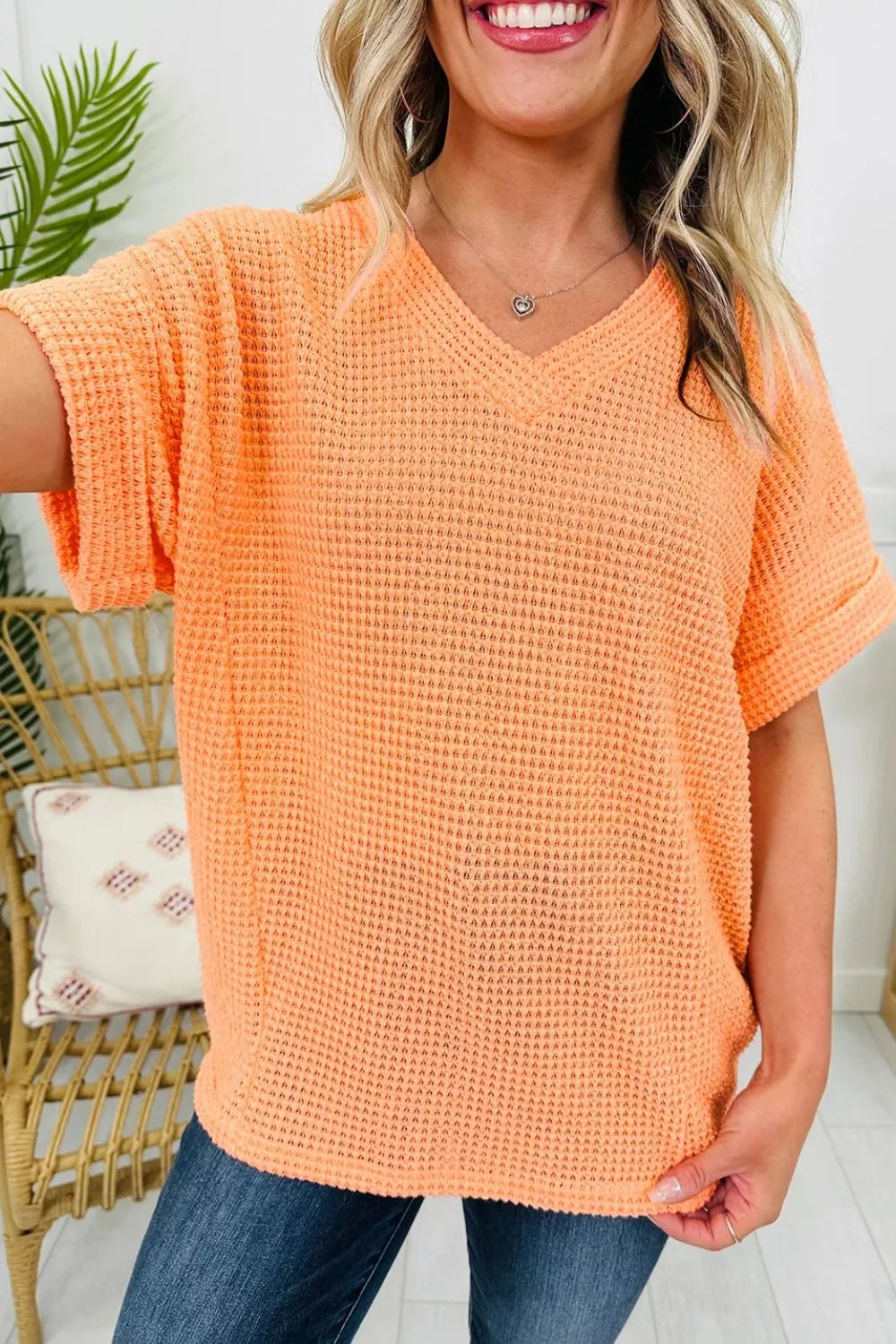 Sherbet waffle knit v-neck t-shirt with cuffed short sleeves.