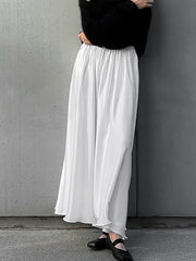 White high-waisted maxi skirt with pockets, flowy and elegant.