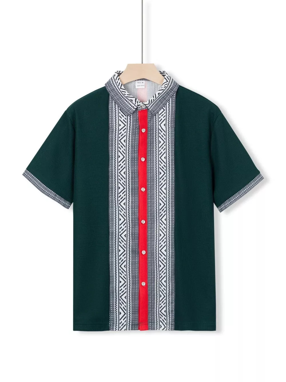 Dark green men's short sleeve shirt with bold geometric print and red button placket.