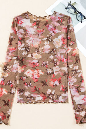 Sheer floral mock neck long sleeve top with lettuce trim.