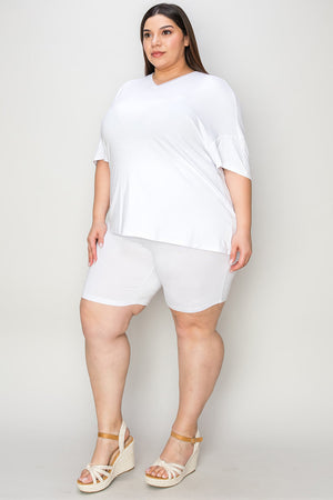 White bamboo loungewear set with relaxed fit v-neck tee and bike shorts.