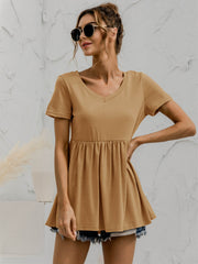 Khaki gathered waistline V-neck tee with short sleeves and a babydoll cut.