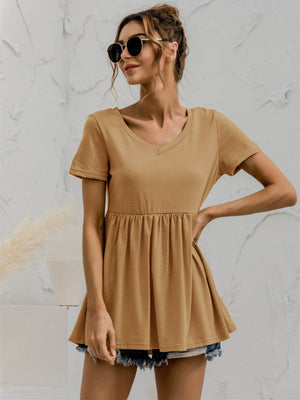 Khaki gathered waistline V-neck tee with short sleeves and a babydoll cut.