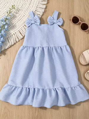 Baby dress in sky blue with bowknot straps and ruffle hem