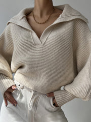 Wide collar balloon sleeve knit sweater in white with a v-neck and ribbed texture.