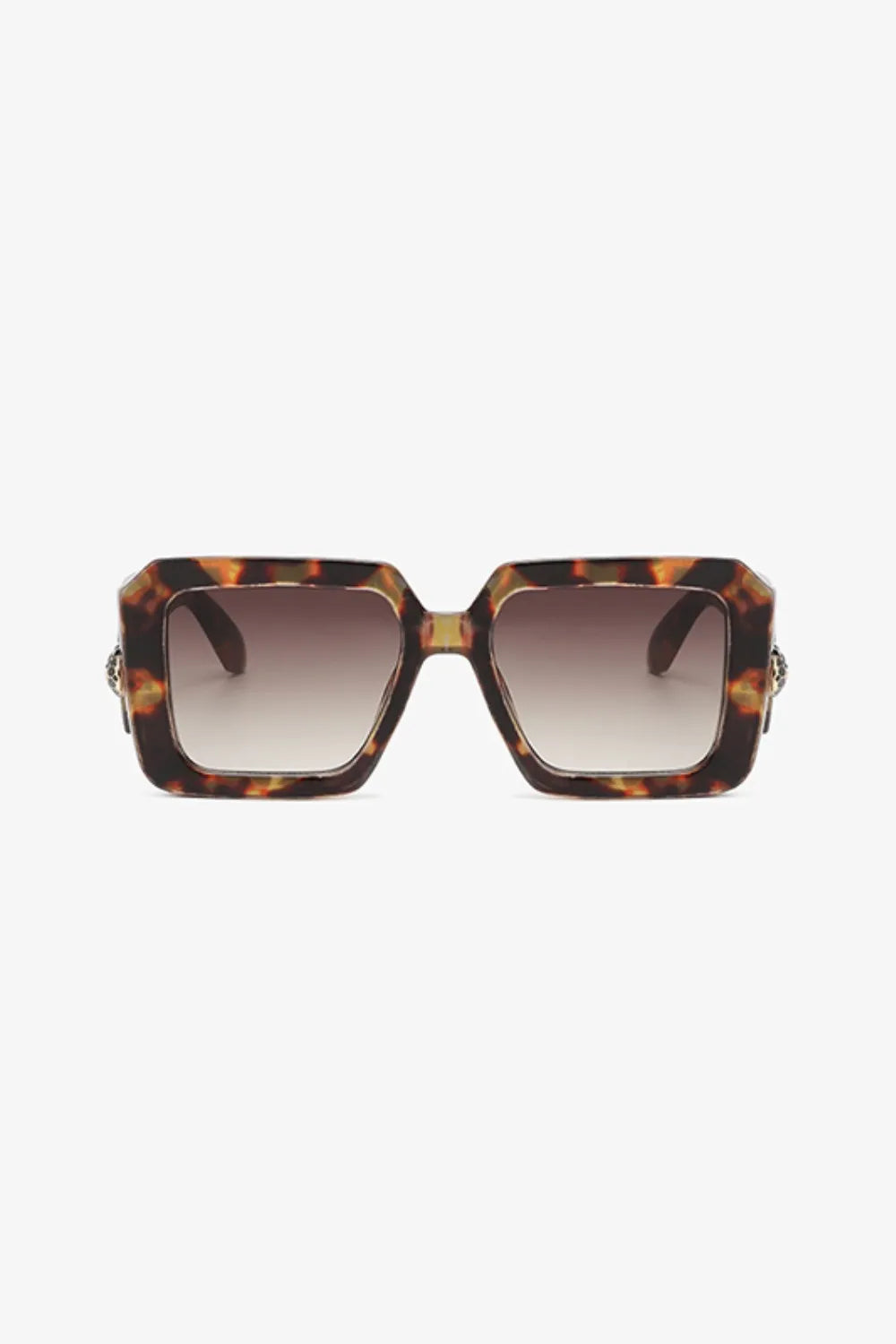 Geometric facet sunglasses in tortoise shell with embellished temples and gradient brown lenses.