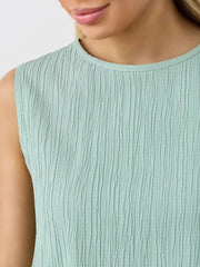 Light green textured cotton tank top with crew neck and sleeveless design