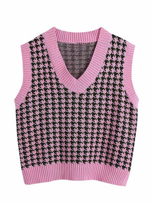 Houndstooth knit v-neck tank top in pink with black pattern.
