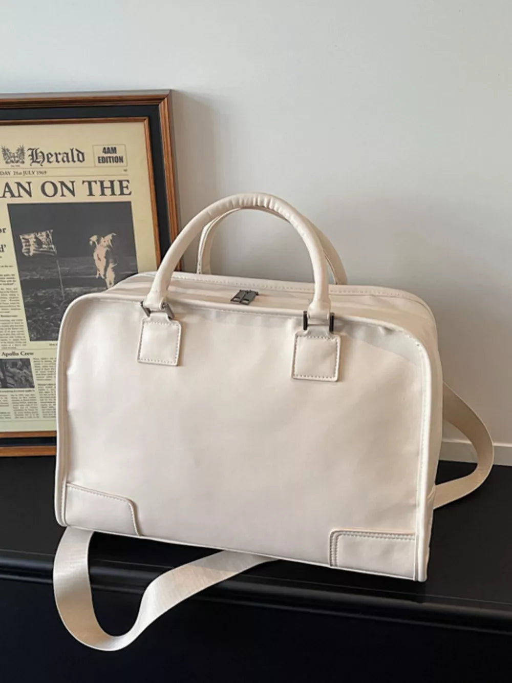Cream pu leather travel bag with top handles and adjustable strap
