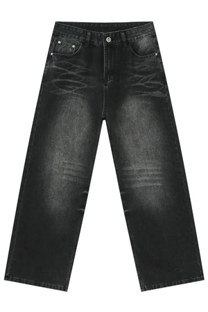Dark wash denim jeans with a distressed, oversized wide-leg silhouette and cat's whisker detailing.