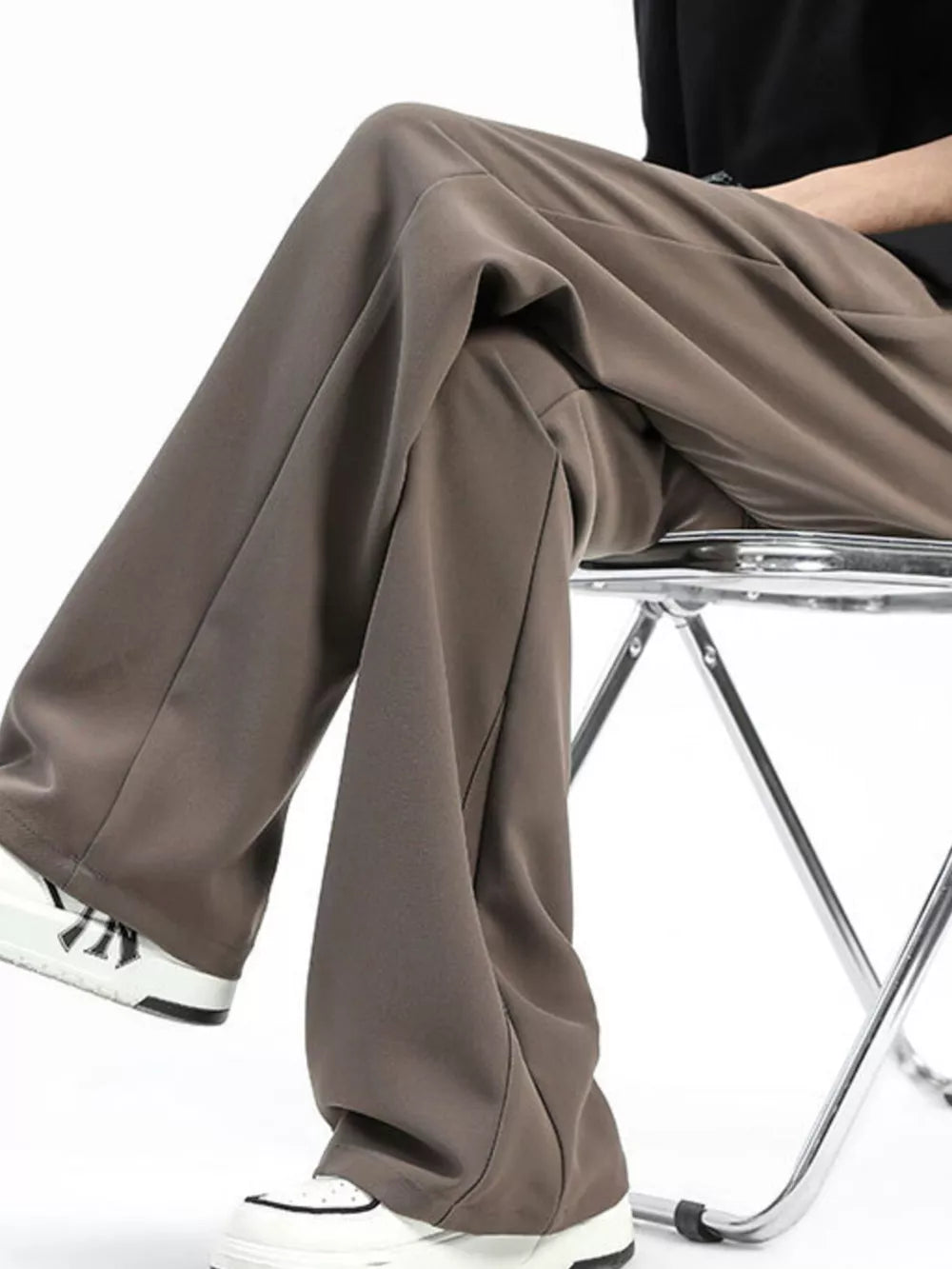 Men's coffee brown sweatpants with a relaxed fit and clean seams.