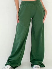 Dark green wide-leg lounge pants with elastic waistband and pockets.